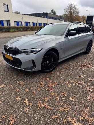 Schadeauto BMW 3-serie 330E M-Sport X-Drive Pano Cruise 2022/9