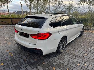 BMW 5-serie M550 5 Touring M550 d xDrive Panorama Trekhaak HUD !! picture 11