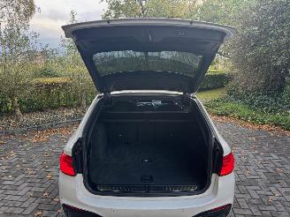 BMW 5-serie M550 5 Touring M550 d xDrive Panorama Trekhaak HUD !! picture 9