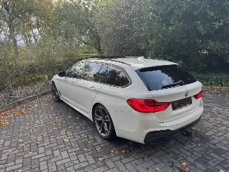 BMW 5-serie M550 5 Touring M550 d xDrive Panorama Trekhaak HUD !! picture 13