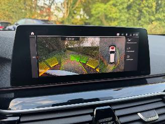 BMW 5-serie M550 5 Touring M550 d xDrive Panorama Trekhaak HUD !! picture 25