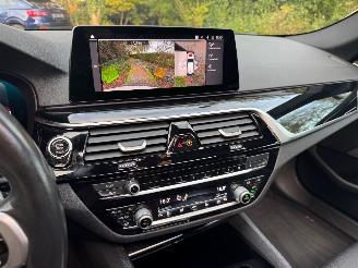 BMW 5-serie M550 5 Touring M550 d xDrive Panorama Trekhaak HUD !! picture 37