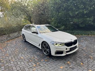 BMW 5-serie M550 5 Touring M550 d xDrive Panorama Trekhaak HUD !! picture 30
