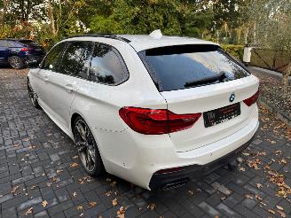 BMW 5-serie M550 5 Touring M550 d xDrive Panorama Trekhaak HUD !! picture 29