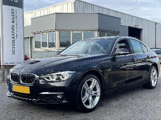 damaged passenger cars BMW 3-serie 320i High Executive AUTOMAAT 2017/9
