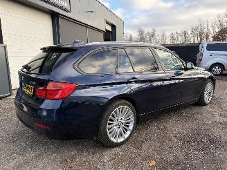 BMW 3-serie 320i xDrive High Executive 4x4 automaat picture 4