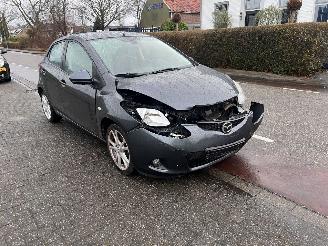 damaged passenger cars Mazda 2 1.3-16V TS Plus 2009/2