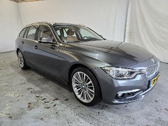 Unfallwagen BMW 3-serie 320i Lux.Ed 2019/2