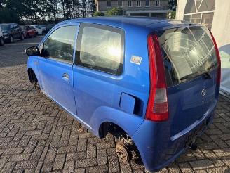 Daihatsu Cuore Cuore (L251/271/276), Hatchback, 2003 1.0 12V DVVT picture 5