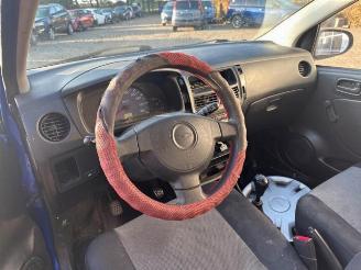 Daihatsu Cuore Cuore (L251/271/276), Hatchback, 2003 1.0 12V DVVT picture 4