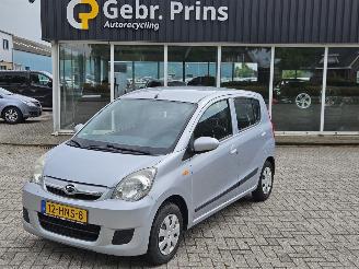 Damaged car Daihatsu Cuore 1.0 12V DVVT Hatchback  Benzine 998cc 51kW (69pk) FWD 2009/1