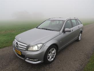 Vaurioauto  passenger cars Mercedes C-klasse 220 CDI 170pk Business Avangarde  2012 Estate navigatie  leer camera [ schadevrij 2012/5