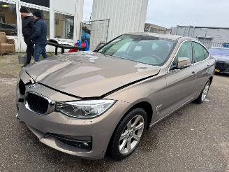 Schadeauto BMW 3-serie Gran Turismo 320i Executive BJ 2014 202.816 KM 2014/1