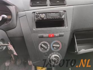 Daihatsu Cuore Cuore (L251/271/276), Hatchback, 2003 1.0 12V DVVT picture 14