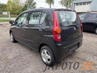 Daihatsu Cuore Cuore (L251/271/276), Hatchback, 2003 1.0 12V DVVT picture 3