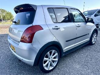 Suzuki Swift 1.3i 92pk GLS 5drs - nap - airco - camera - touchscreen multimedia - bleutooth - alcantara hemel + stuur picture 5