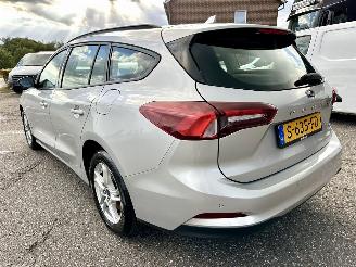 Ford Focus Wagon 1.0 EcoB Hybrid 135pk 6-bak Con - 97dkm nap - navi - airco - cruise - pdc - line + front assist - lmv picture 6