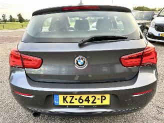 BMW 1-serie 118i 136pk 6-bak Cent Sportline 5drs - schuifdak - nap - leer - navi - stoelverw - licht + regensensor picture 6