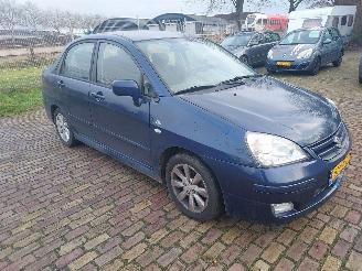 uszkodzony samochody osobowe Suzuki Liana 1.6 Airco + Apk 2004/3