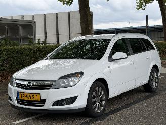 damaged passenger cars Opel Astra STATION WAGON 1.6 111 years Edition 2010/11