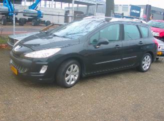 skadebil auto Peugeot 308 sw 7 persoons 2008/1