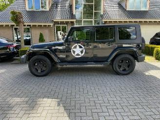 Coche accidentado Jeep Wrangler Unlimited 2.8 CRD SAHARA 2010/1
